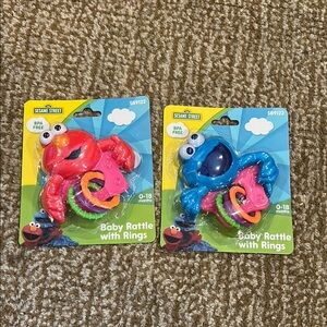 Sesame Street Baby Rattle with Rings - Red and Blue. Brand new.